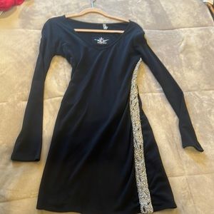 Twisted heart long sleeve black dress size small in good condition.